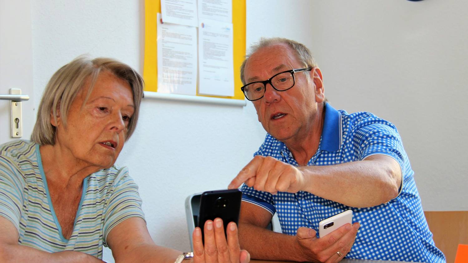 Parents reviewing a custody calendar together