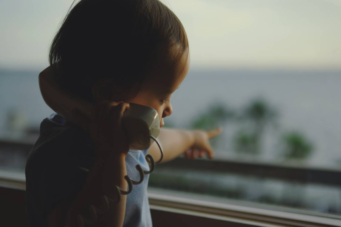 Child video-calling non-custodial parent during California move-away case