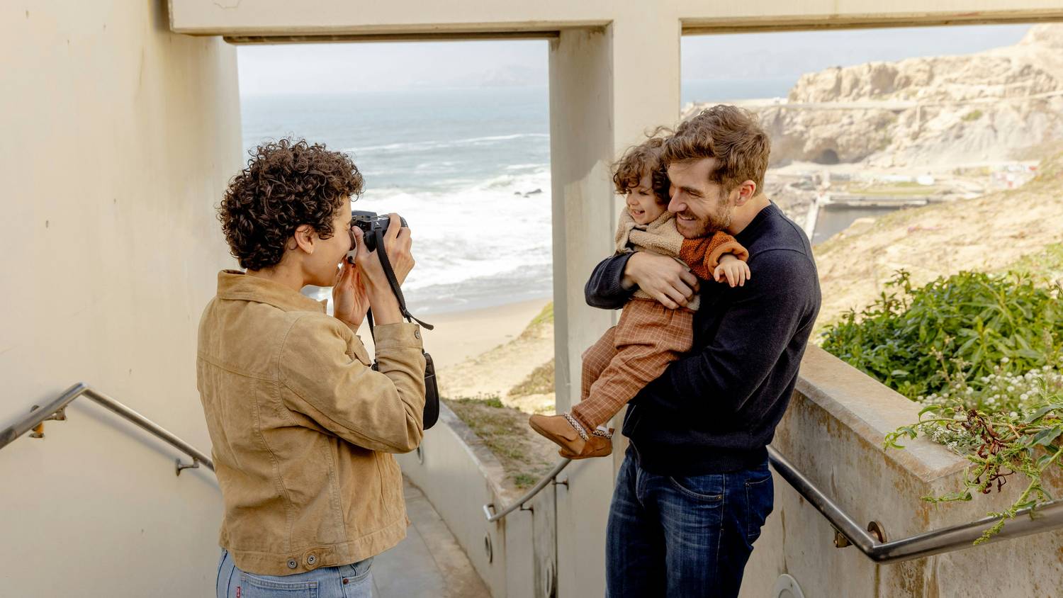 Parents exchanging their child during a scheduled California visitation hand-off