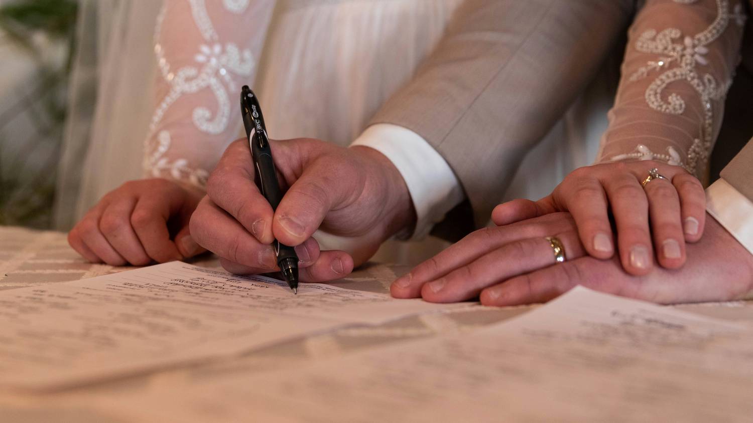 Divorce forms neatly stacked with a pen and California courthouse emblem