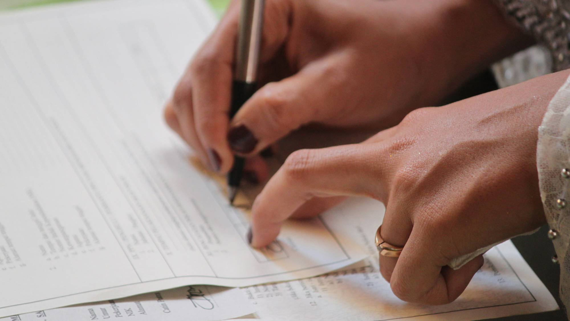 Couple reviewing property documents during California divorce